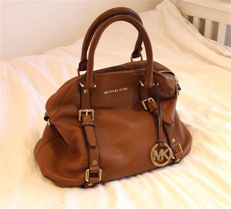 selling used michael kors bags|Michael Kors second hand bags.